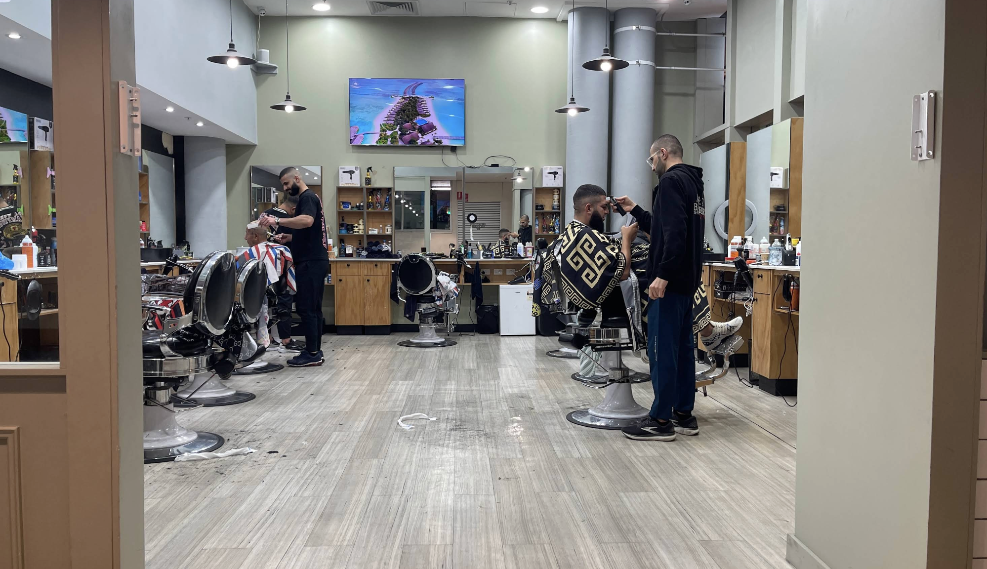 A&Z Barber Shop barbers working in the shop